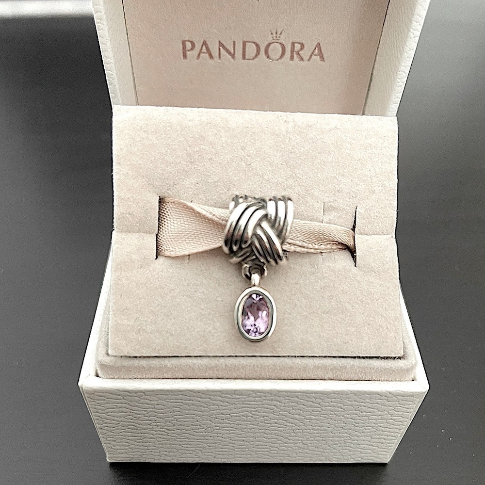 Pandora tied together charm